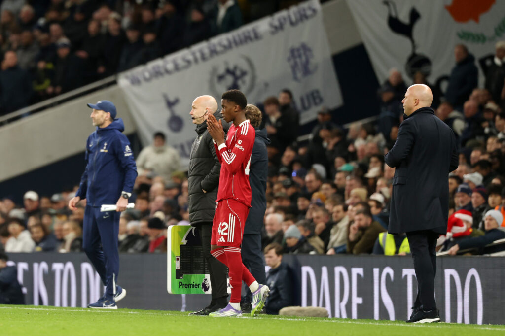 Trey Nyoni prepares to come on as a substitute during Liverpool's Premier League match against Tottenham Hotspur