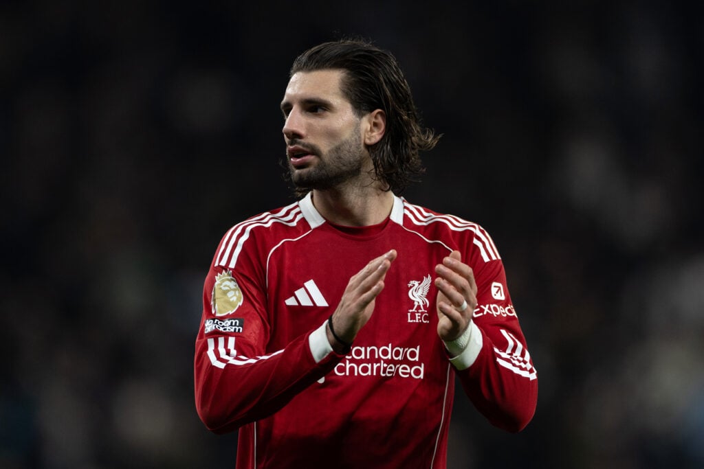 Dominik Szoboszlai applauds fans after Liverpool's Premier League win at the Tottenham Hotspur Stadium