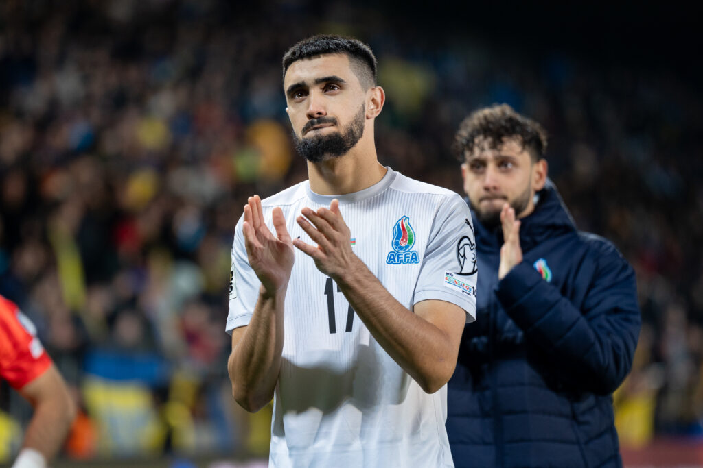 Azerbaijan's Toral Bayramov applauds after the FIFA World Cup qualifier against Ukraine