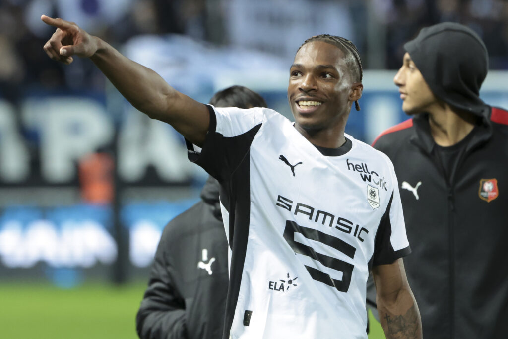 Jeremy Jacquet points to the stands at the end of Rennes' Ligue 1 match against Paris FC