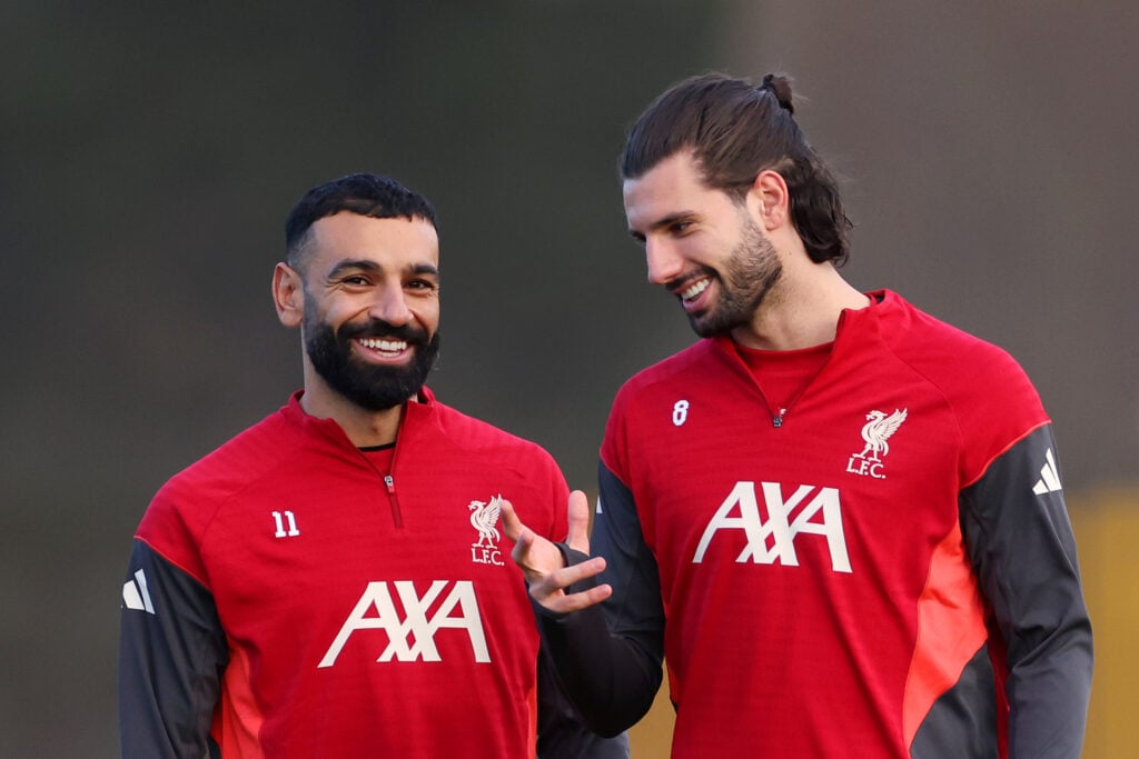 Mohamed Salah and Dominik Szoboszlai of Liverpool react during a Liverpool Training Session at AXA Training Centre