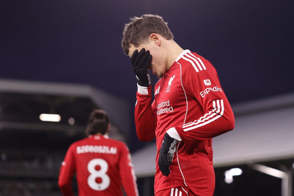 Florian Wirtz covers his face with his hand during Liverpool's Premier League match against Fulham at Craven Cottage.