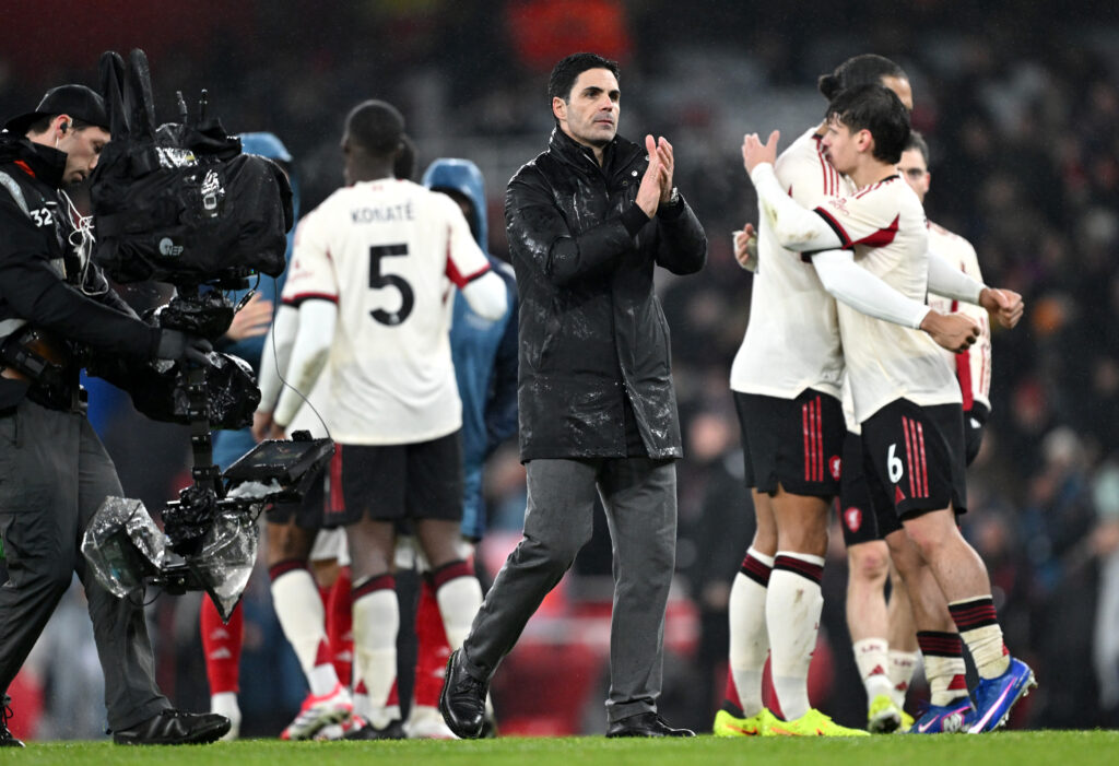 Mikel Arteta applauds fans while surrounded by Liverpool players after Arsenal's Premier League game against Liverpool at the Emirates Stadium
