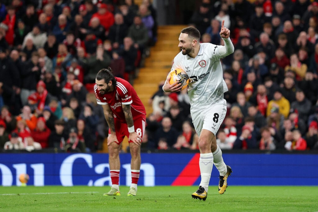 Adam Phillips celebrates after scoring for Barnsley during the FA Cup tie with Liverpool at Anfield