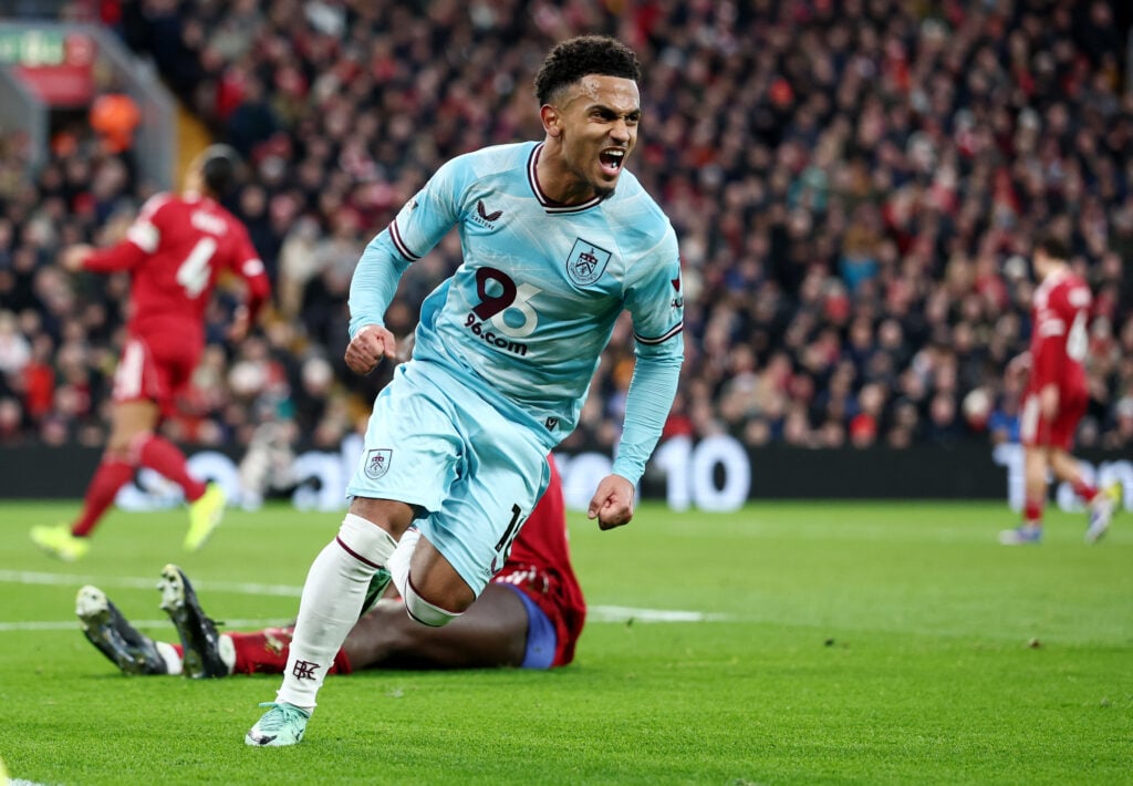 Marcus Edwards celebrates after scoring for Burnley in the Premier League match against Liverpool at Anfield.