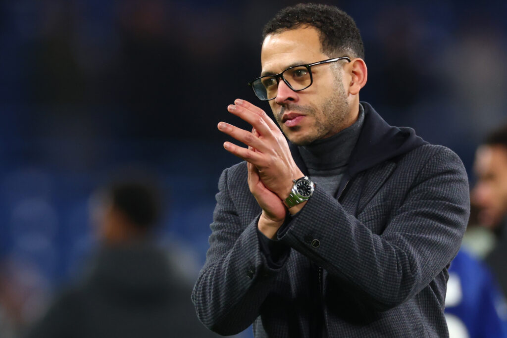 Liam Rosenior applauds Chelsea fans after the UEFA Champions League match against Pafos at Stamford Bridge