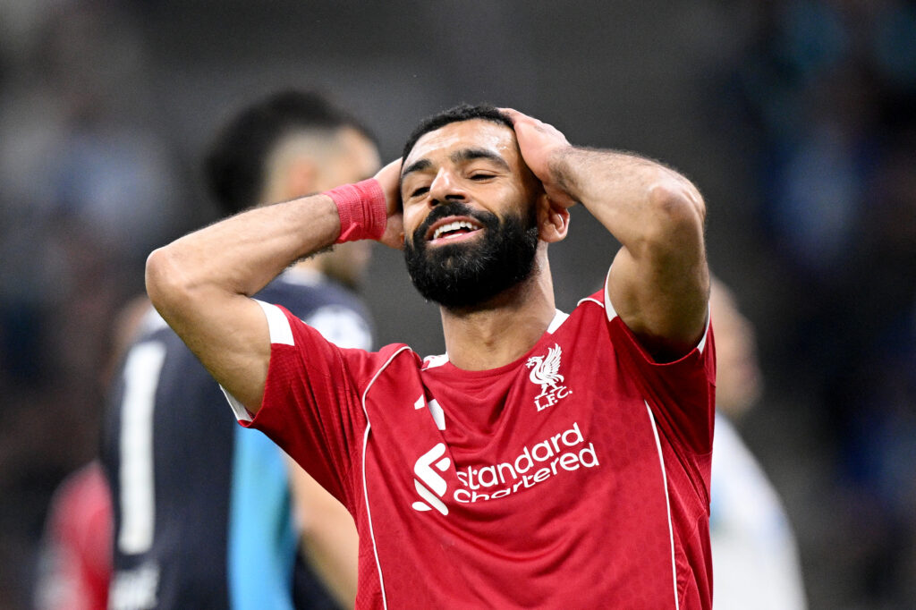 Mohamed Salah puts his hands on his head after missing a chance during Liverpool's UEFA Champions League match against Marseille at Stade Velodrome