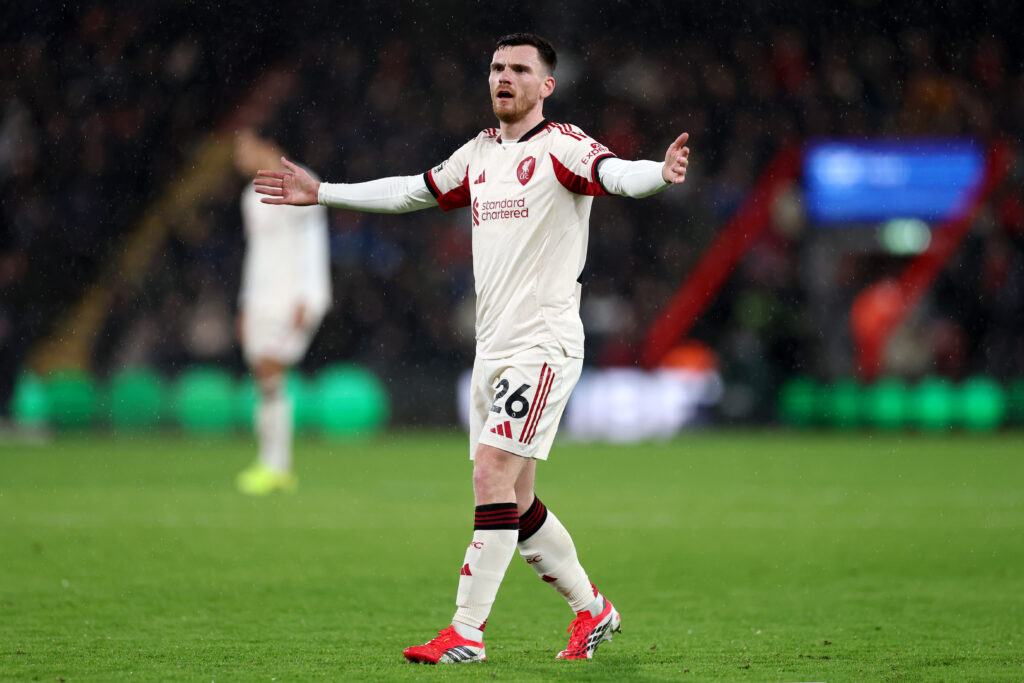 Andy Robertson outstretches his arms during Liverpool's Premier League match against Bournemouth at the Vitality Stadium