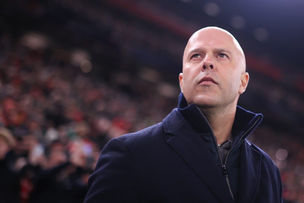 Arne Slot looks towards the Kop ahead of Liverpool's UEFA Champions League match against Qarabag at Anfield.
