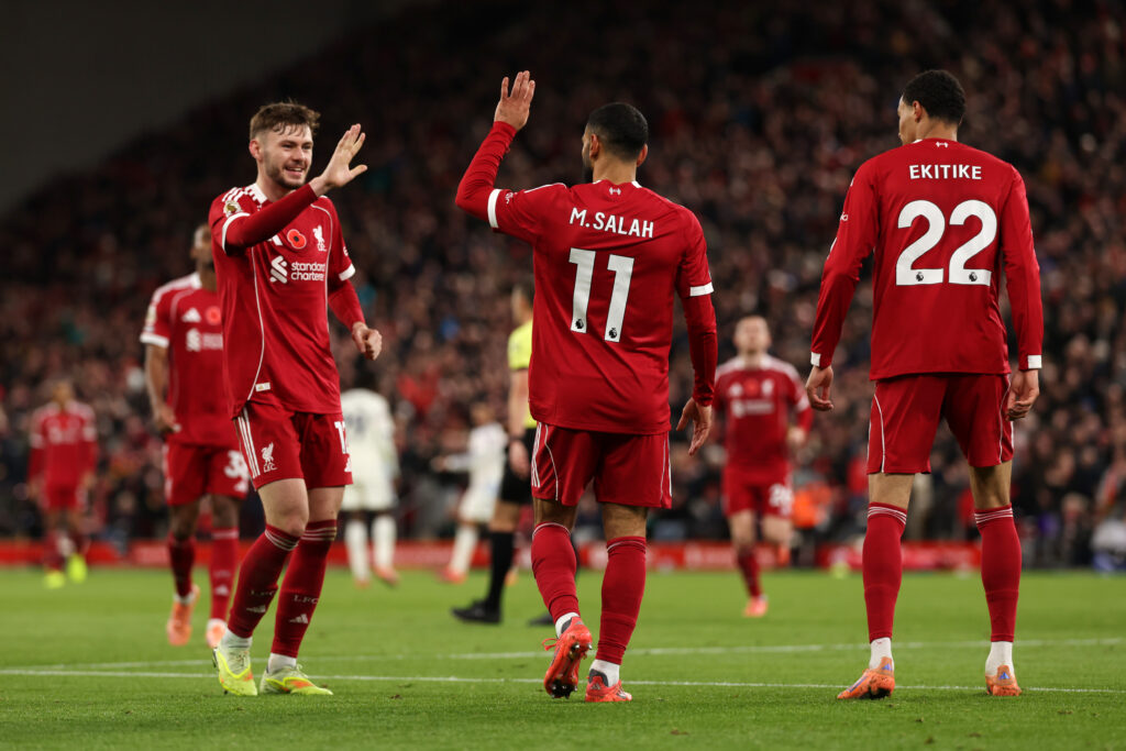 Mohamed Salah high fives Conor Bradley after scoring for Liverpool against Aston Villa in the Premier League at Anfield.