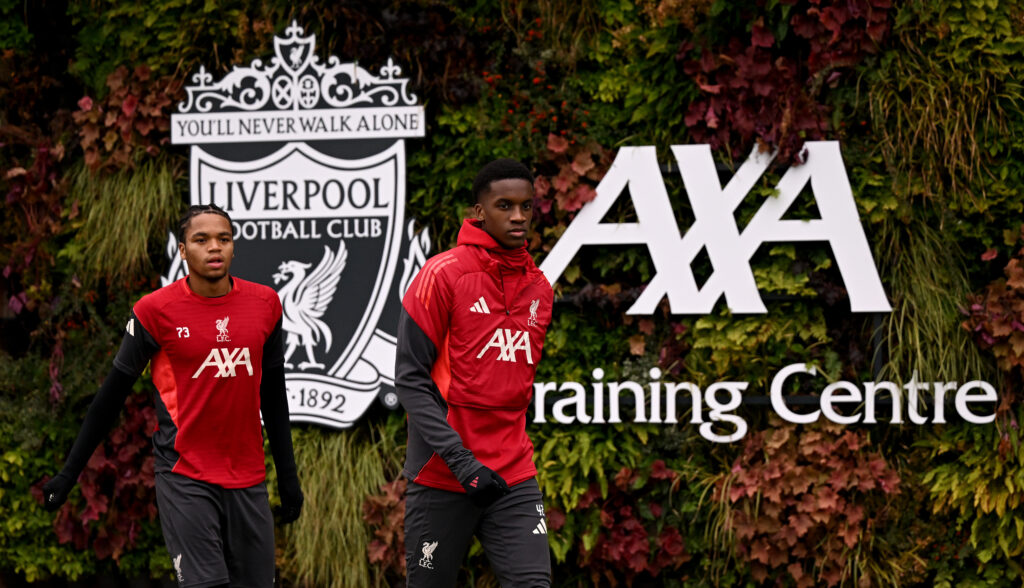 Rio Ngumoha and Trey Nyoni walk out for a Liverpool training session at the AXA Training Centre