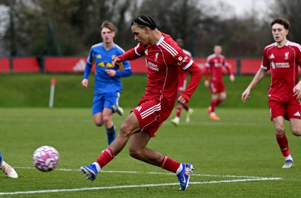 Clae Ewing crosses the ball during Liverpool U21s match against Leeds at the AXA Training Centre