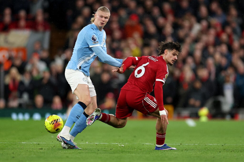 Erling Haaland battles Milos Kerkez for the ball during Liverpool vs Manchester City in the Premier League at Anfield