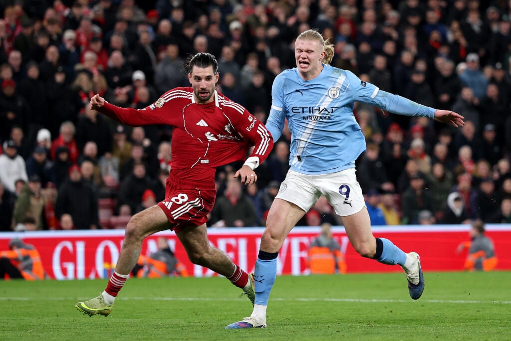 Dominik Szoboszlai fouls Erling Haaland and is sent-off during Liverpool's Premier League match against Manchester City at Anfield.