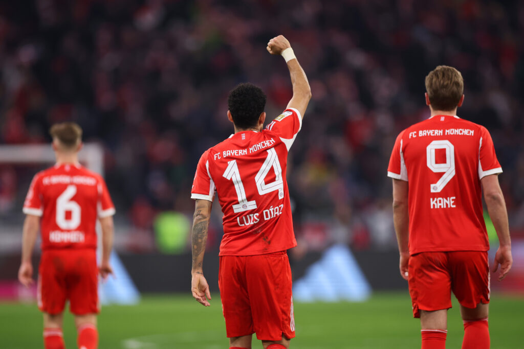 Luis Diaz raises his fist in celebration after scoring for Bayern Munich against Hoffenheim in the Bundesliga at Allianz Arena.