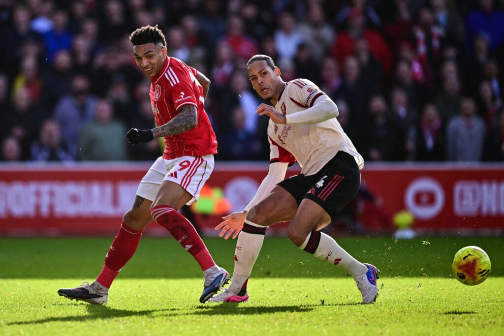 Virgil van Dijk challenges Igor Jesus for the ball during the Premier League match between Liverpool and Nottingham Forest at the City Ground