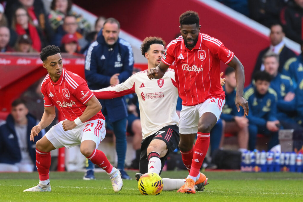 Curtis Jones appeals after losing the ball to Ibrahim Sangare during Liverpool's Premier League match against Nottingham Forest at the City Ground