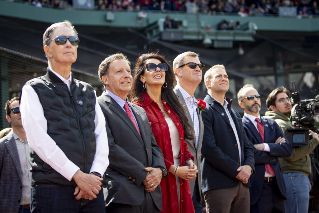FSG ownership line up for a photo at Boston Red Sox fixture