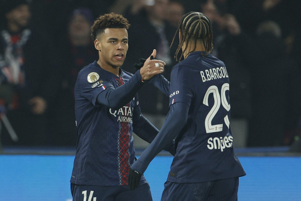 Bradley Barcola and Desire Doue celebrate scoring for PSG