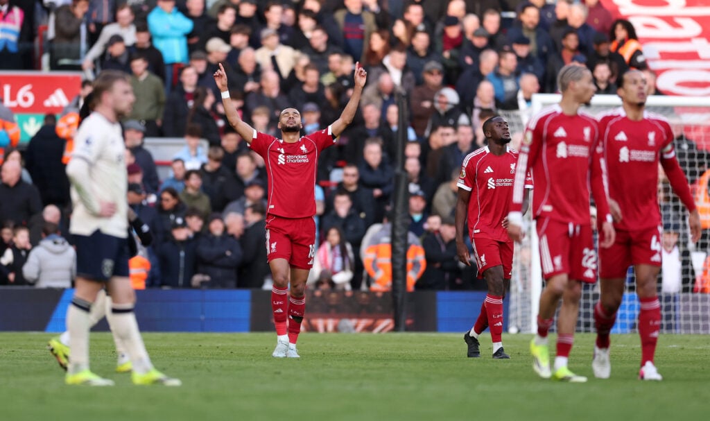 Cody Gakpo points to the sky in celebration after scoring for Liverpool against West Ham in the Premier League at Anfield