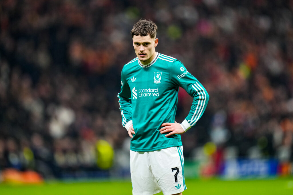 Florian Wirtz looks on with his hands on his hips during Liverpool's UEFA Champions League match against Galatasaray at RAMS Park.