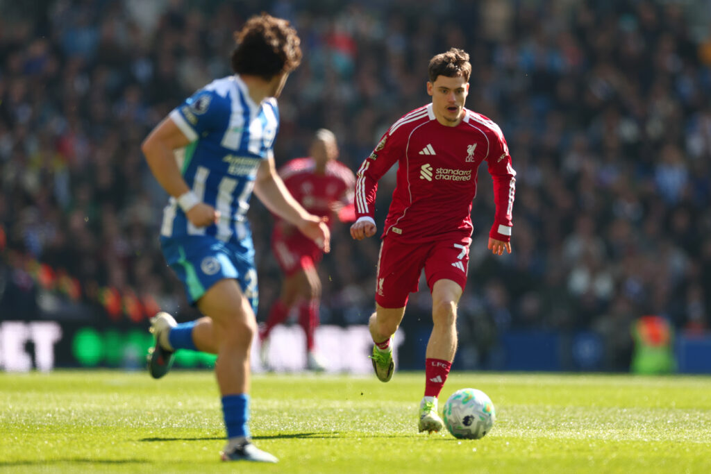 Florian Wirtz runs with the ball during Liverpool's Premier League match against Brighton & Hove Albion at the Amex Stadium