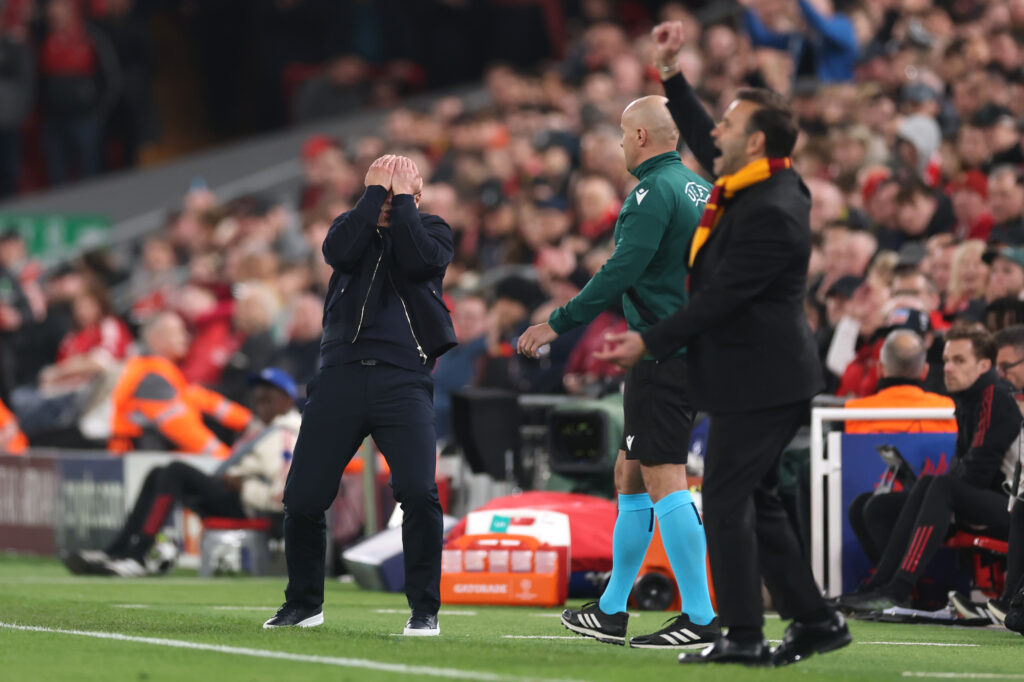 Arne Slot puts his hands on his head during Liverpool's UEFA Champions League match against Galatasaray at Anfield.