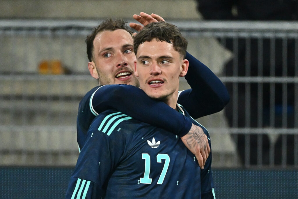 Florian Wirtz celebrates with David Raum after scoring for Germany during their international friendly against Switzerland