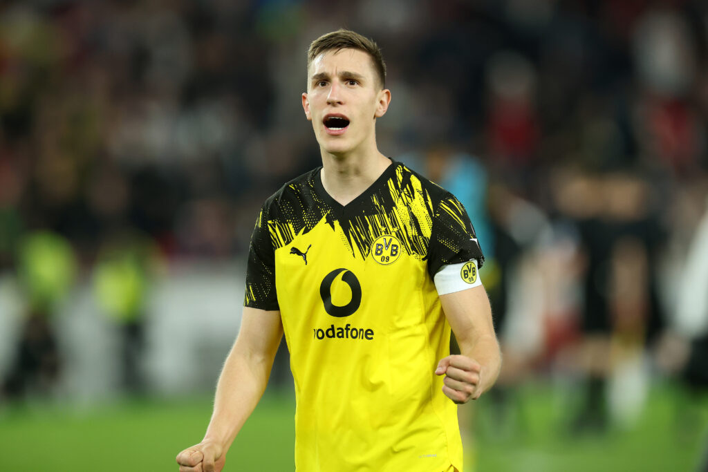 Nico Schlotterbeck celebrates after Borussia Dortmund's Bundesliga win over VfB Stuttgart.