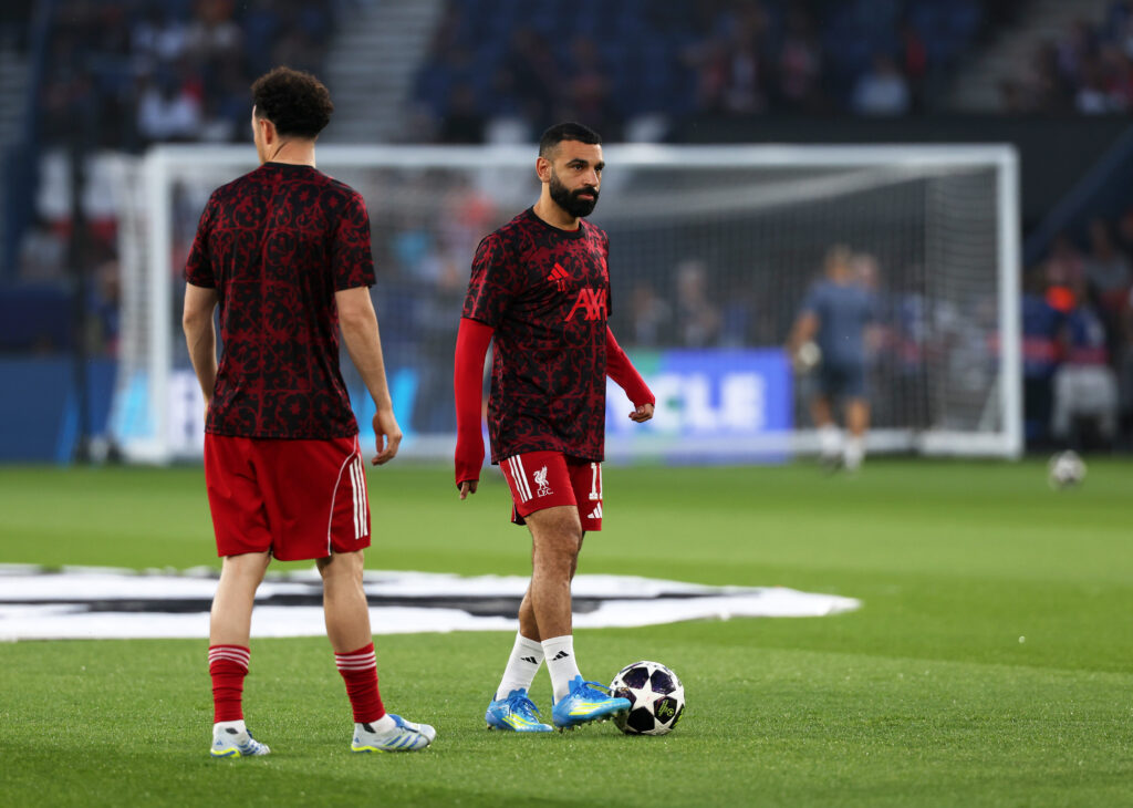 Mohamed Salah warms up ahead of Liverpool's UEFA Champions League quarter-final match against Paris Saint-Germain at Parc des Princes