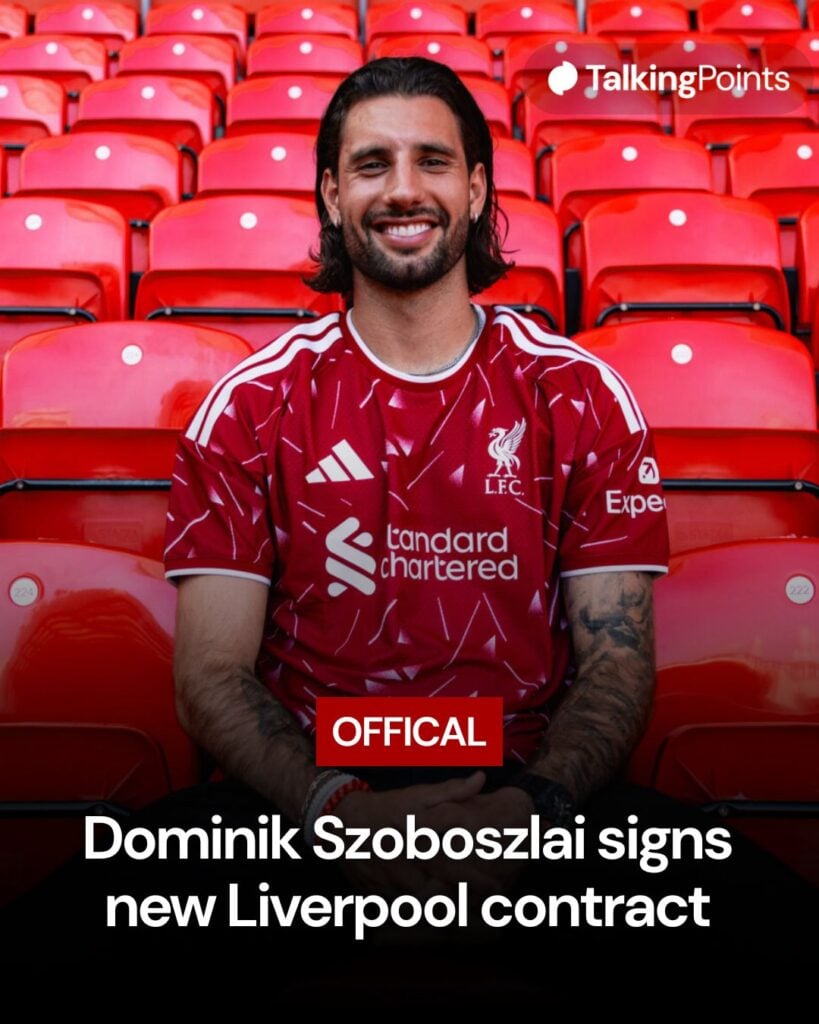 Dominik Szoboszlai smiles as he sits in the Anfield stands after signing a new contract with Liverpool (Credit: Getty Images/Nikki Dyer/Liverpool FC).
